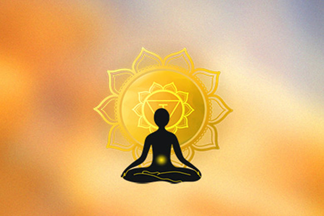 Silhouette of a meditating figure, illuminated by a glowing chakra symbol, set against a soft orange and blue gradient background.
