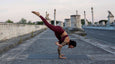Yoga Teacher Clotilde in Rocket Yoga Inversion